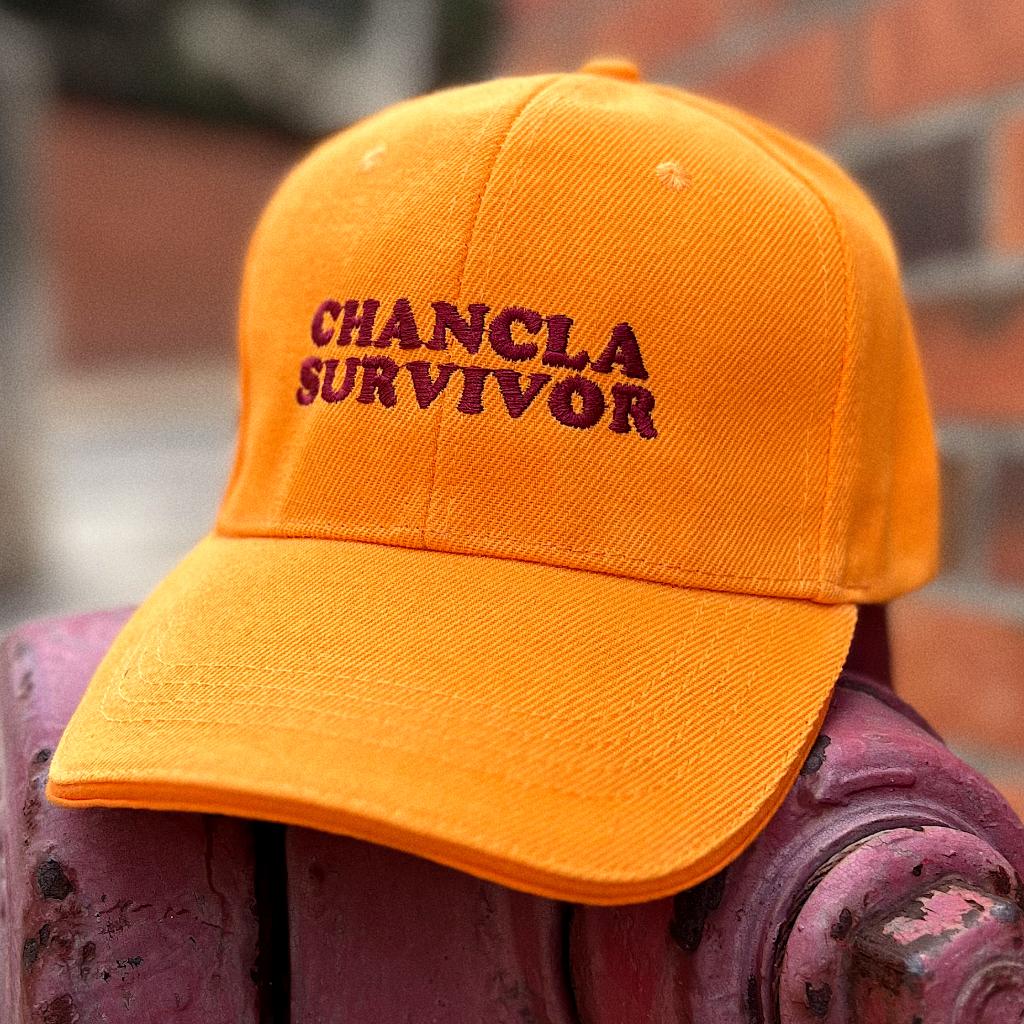 Orange Cap – "Chancla survivor"
